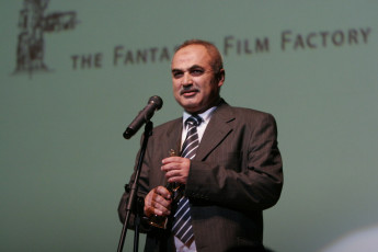 The Jordanian Consul standing in for Amin Matalqa, for the prize Best Screenplay Feature film – for “Captain Abu Raed”