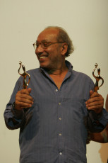 Fadel Jeaibi with the two przes he won for his film “Junuun”, Jury Special Prize Best Actor, and Best Feature Film