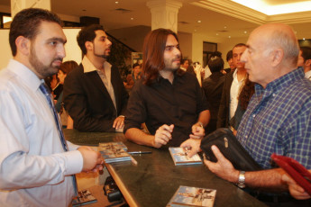 Composer of the music for Melodrama Habibi, Khaled Mouzannar signing the DVDs