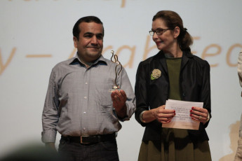 Shawkat Amin Korki, taking his prize for Best Screen Play Feature Film, for “Kick Off”